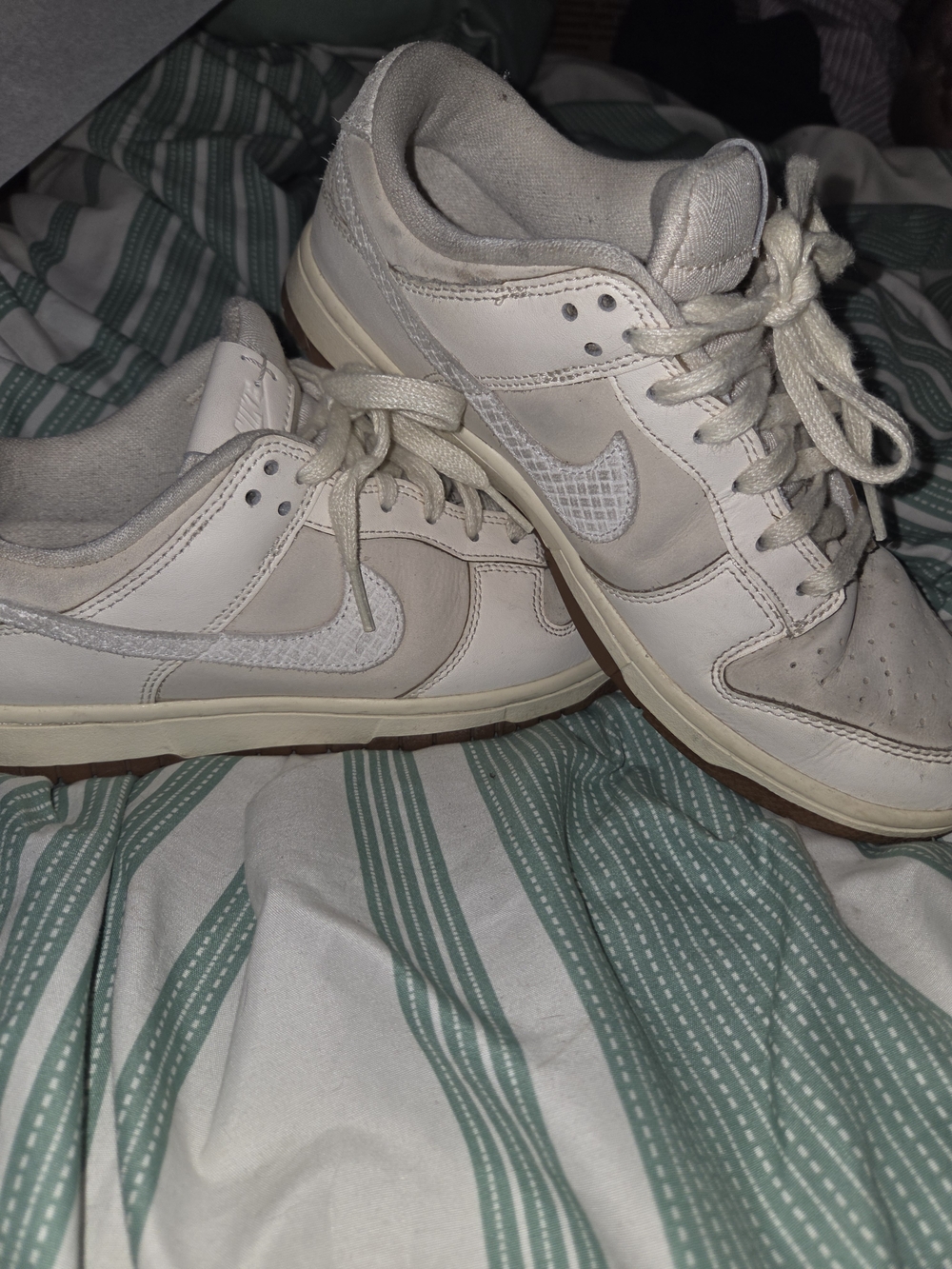Nike Dunk Low - White / Light Bone / Gum Sole
Size: Women's 7.5